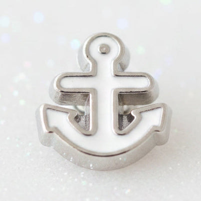 A small silver metal anchor-shaped charm with a smooth, polished finish, shown against a plain light background.